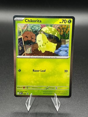 Chikorita - Perfect Order - Black Star Promo - 069 Cosmos NM Double Swirl