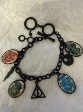 Pulsera Harry Potter Hogwarts Casas y Símbolos Metal Negro Dije