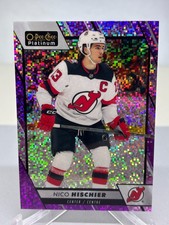 23-24 Nico Hischier #126 OPC Platinum Violet Pixels /299 New Jersey Devils