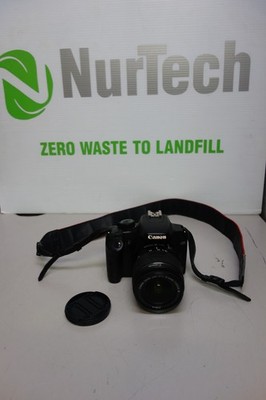 Canon EOS 1000D Camera w/Canon Zoom Lens EF-S 18-55mm 1:3.5-5.6 III + Strap