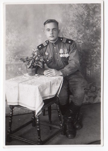 WWII Hero Russian soldier Military uniform Order Awards Soviet Army Studio photo