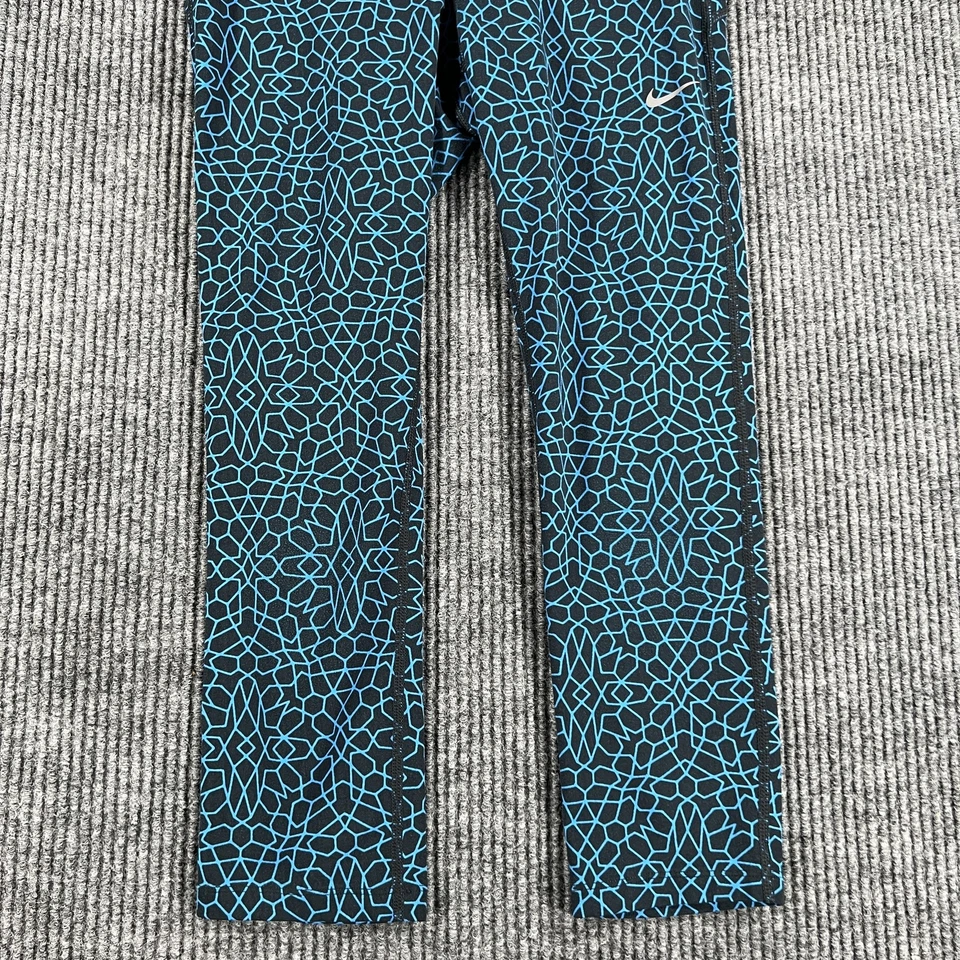 Calça de corrida Nike Dri-FIT feminina pequena azul estampa geométrica detalhes reflexivos - Imagem 3 de 4