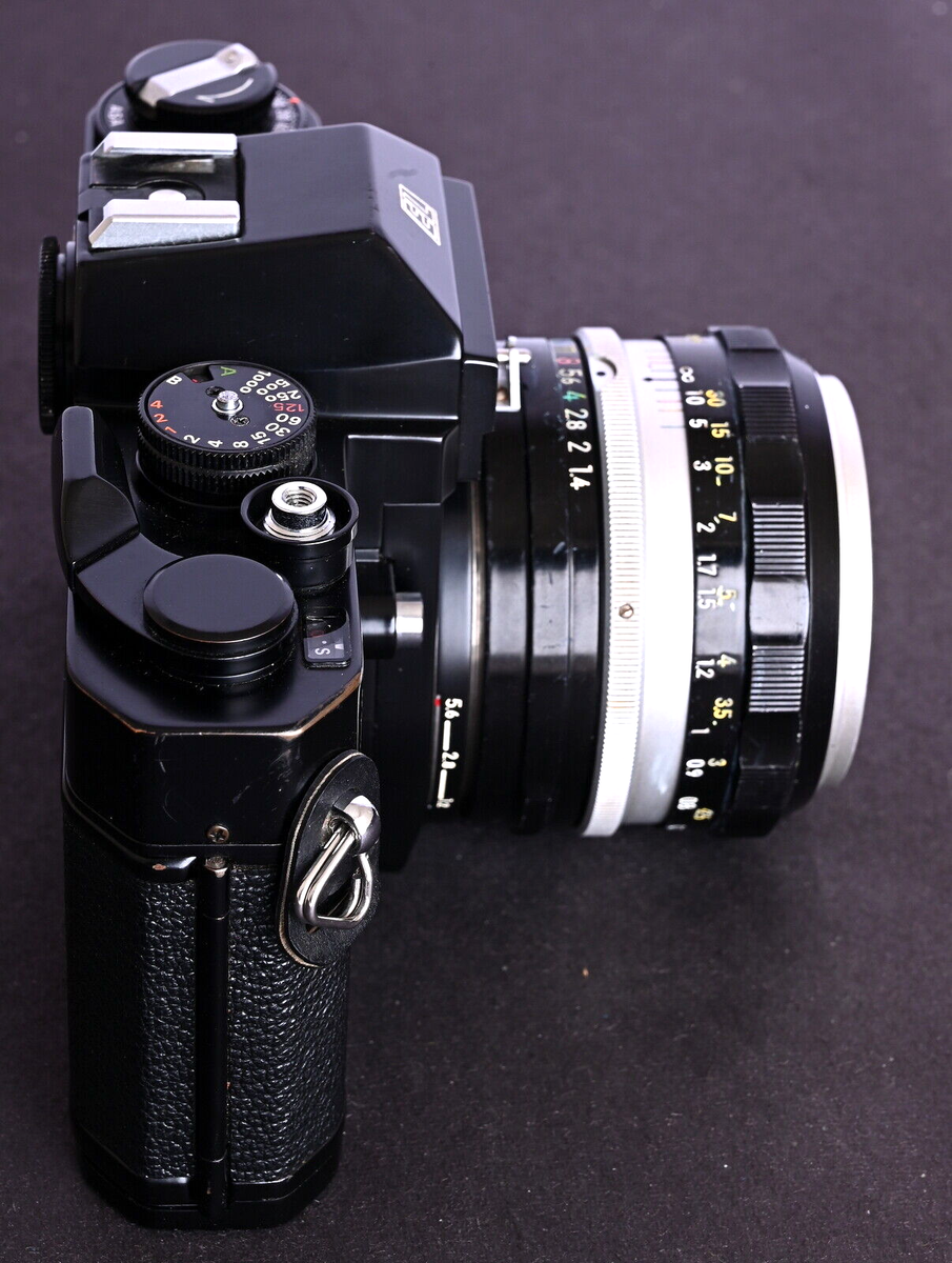 Nikomat EL Black 35mm Film SLR c/w N. K. NIKKOR-S 50mm f/1.4 Lens