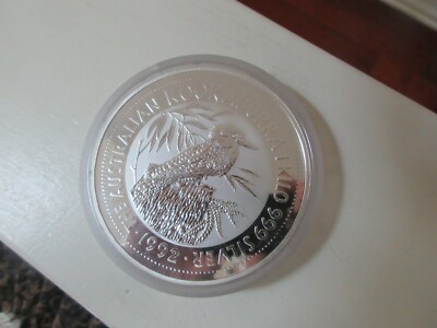 赤道ギニア 1992年 銀貨 純銀999 1kg アフリカ象親子 希少自然保護 s-l400.jpg