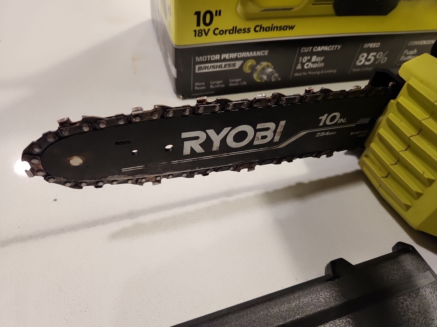 Ryobi P2520 18V Chainsaw with 4Ah Battery and Charger (BRAKE DOES NOT