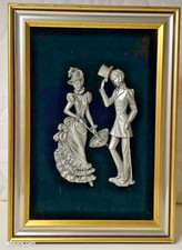 Tableau avec personnage en étain en relief signé D.Douché 32*23cm