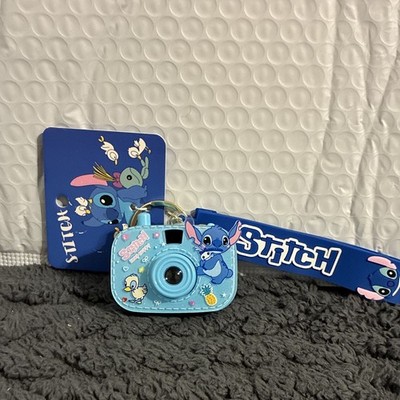 Disney Stitch Keychain - new one in bag/each click shows a new image on wall