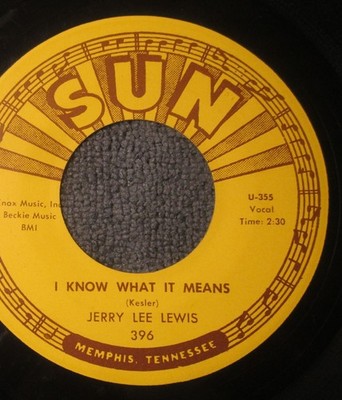 Jerry Lee Lewis  . Sun 396.  I know what it means .   45  original item.  as new