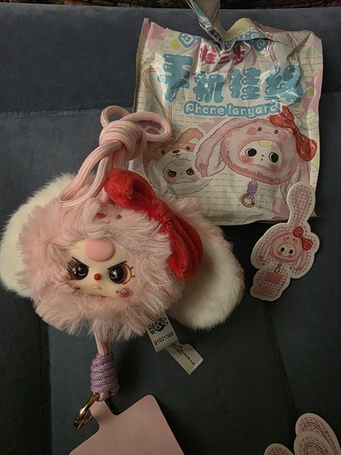 Très jolie lanière de téléphone portable bébé trois yeux spéciaux lapin