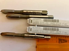 OSG brand spiral point taps.  (2 each 1/4-20 and 1/4-28)    Selling as a lot.