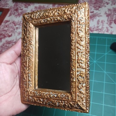 394. Small Rectangular Mirror in ornate gold frame