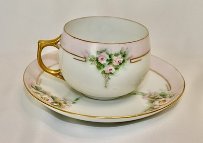 J&C JAEGER & CO. PORCELAIN CUP AND SAUCER SET, SIGNED BY ARTIST,1898-1923, #324