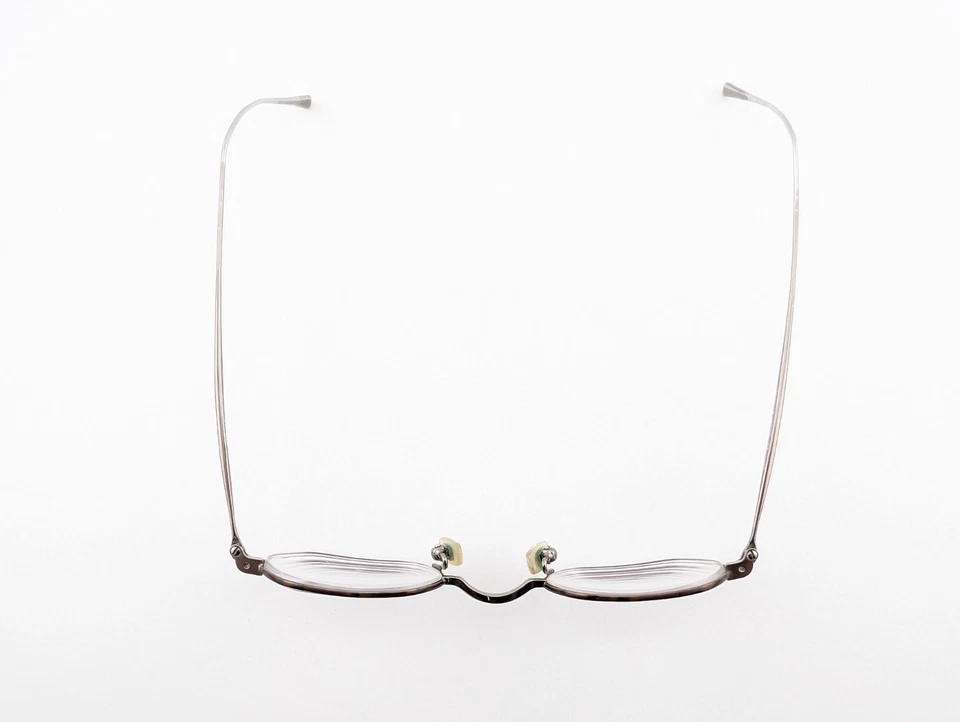 Gafas DKNY, solo monturas, 6570 215 plateadas, 42-22-145, metal, Japón Foto 3 de 4