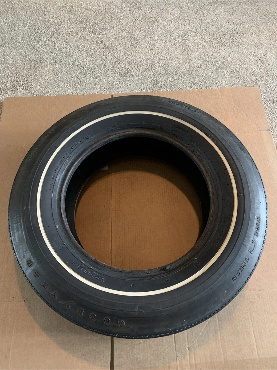 Goodyear 15 Inch Performance Tires, with Vintage Car Part for sale