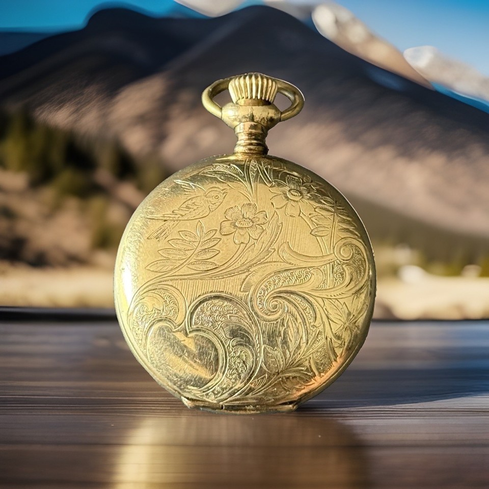 A working antique American Waltham pocket watch in an engraved filled case — Waltham is a legendary American horological brand and this is the real deal.