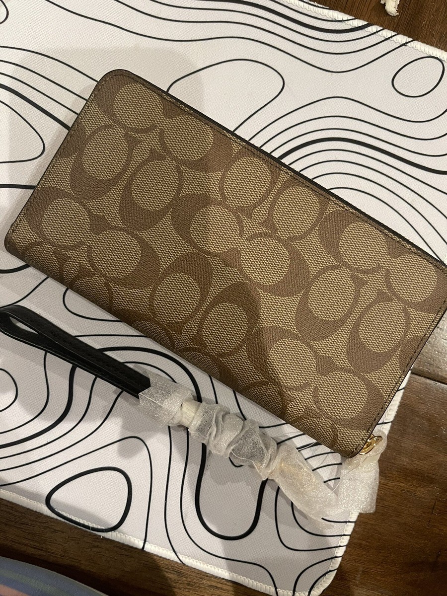 Coach x Jean Michel Basquiat long zip around wallet signature