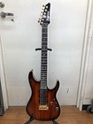 Ibanez AZ47P2K Dragoneyeburst used electric guitar with gold hardware, black pickguard, and five-piece neck construction.