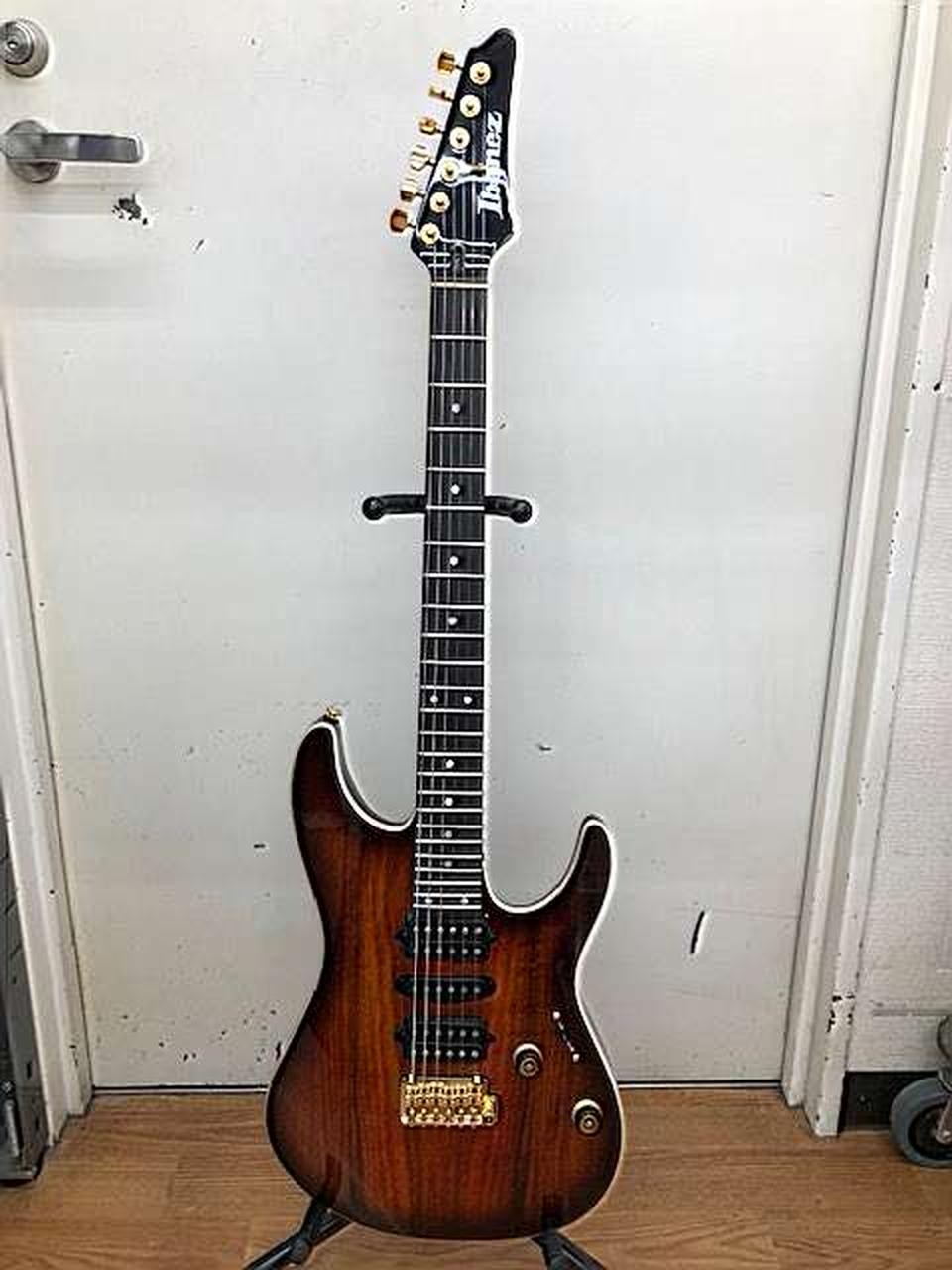 Ibanez AZ47P2K Dragoneyeburst used electric guitar with gold hardware, black pickguard, and five-piece neck construction.