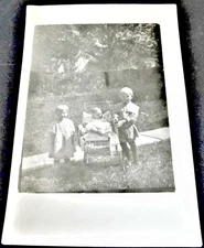 Group of Children family members Real Photo Postcard- AZO (1904-1918).      