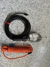 Indoor and Outdoor Light Duty Orange Vinyl Extension Cord plus shop light - work