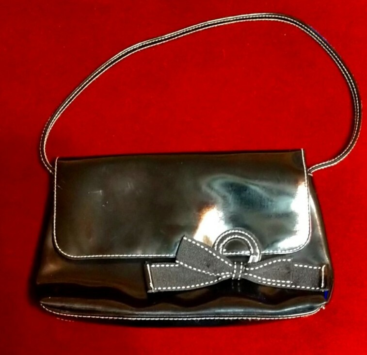 Victoria's Secret black leather bow red lining purse