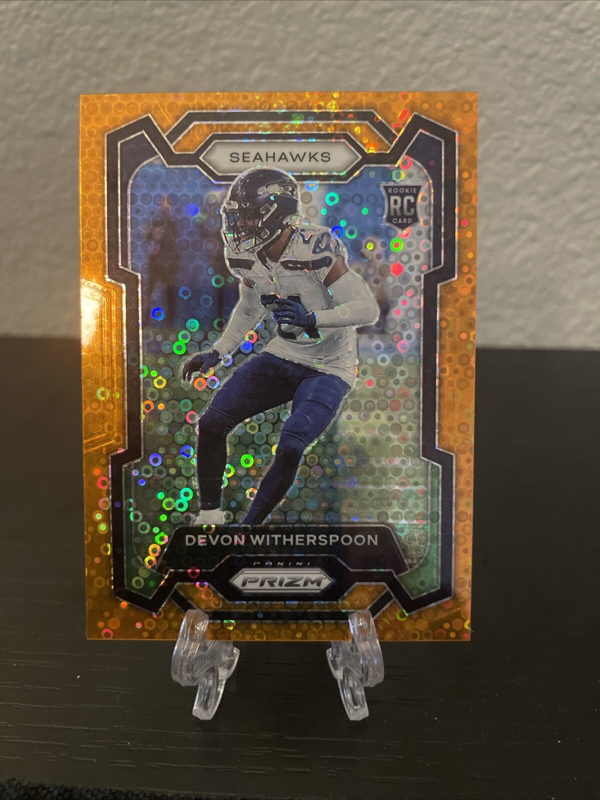 Devon Witherspoon 2023 Panini Prizm RC Orange Disco Prizm Rookie #389