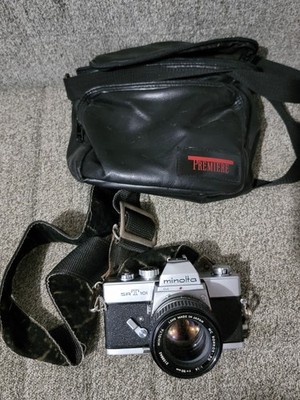 Minolta SRT101 Silver Film Camera with MC Rokkor PF 55m F/1.7 With Carry Case