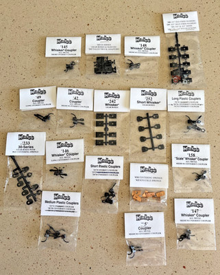 Kadee Assortment Of Couplers, Whiskers, Adaptors, Springs, & More Lot Of 17