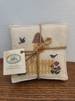 4 Alice cottage Mug Mats