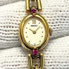 SEIKO Ladies Gold Tone Quartz Oval Bracelet Watch 2 Stone Roman Dial 1E20-6140