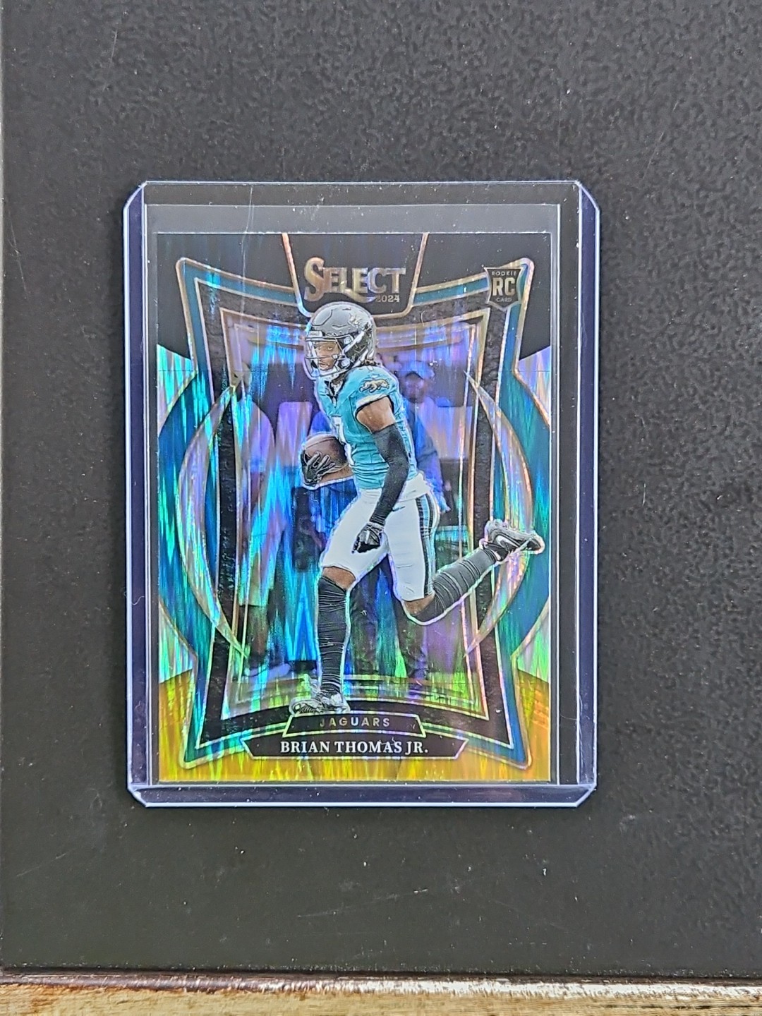 2024 Panini Select -Concourse Brian Thomas Jr. #91 Black & Gold Shock Prizm (RC)