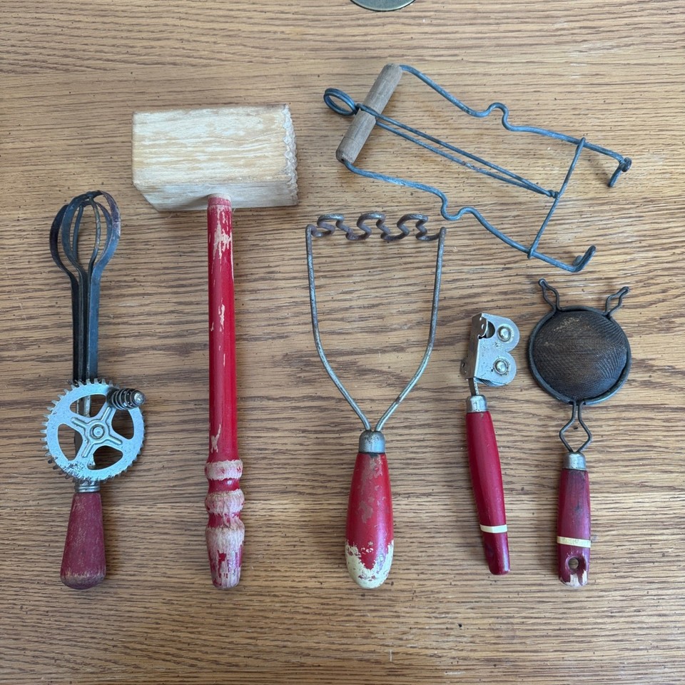 USA-made red wood-and-metal kitchen set with a blender and masher — a cohesive, visually striking vintage collection that's actually usable.