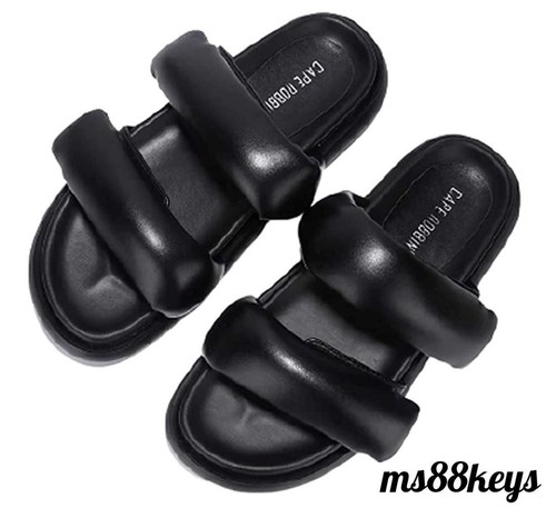 black puffy sandals