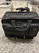 Brookstone Black Nylon Carrying Case With Detachable Wheels/handle