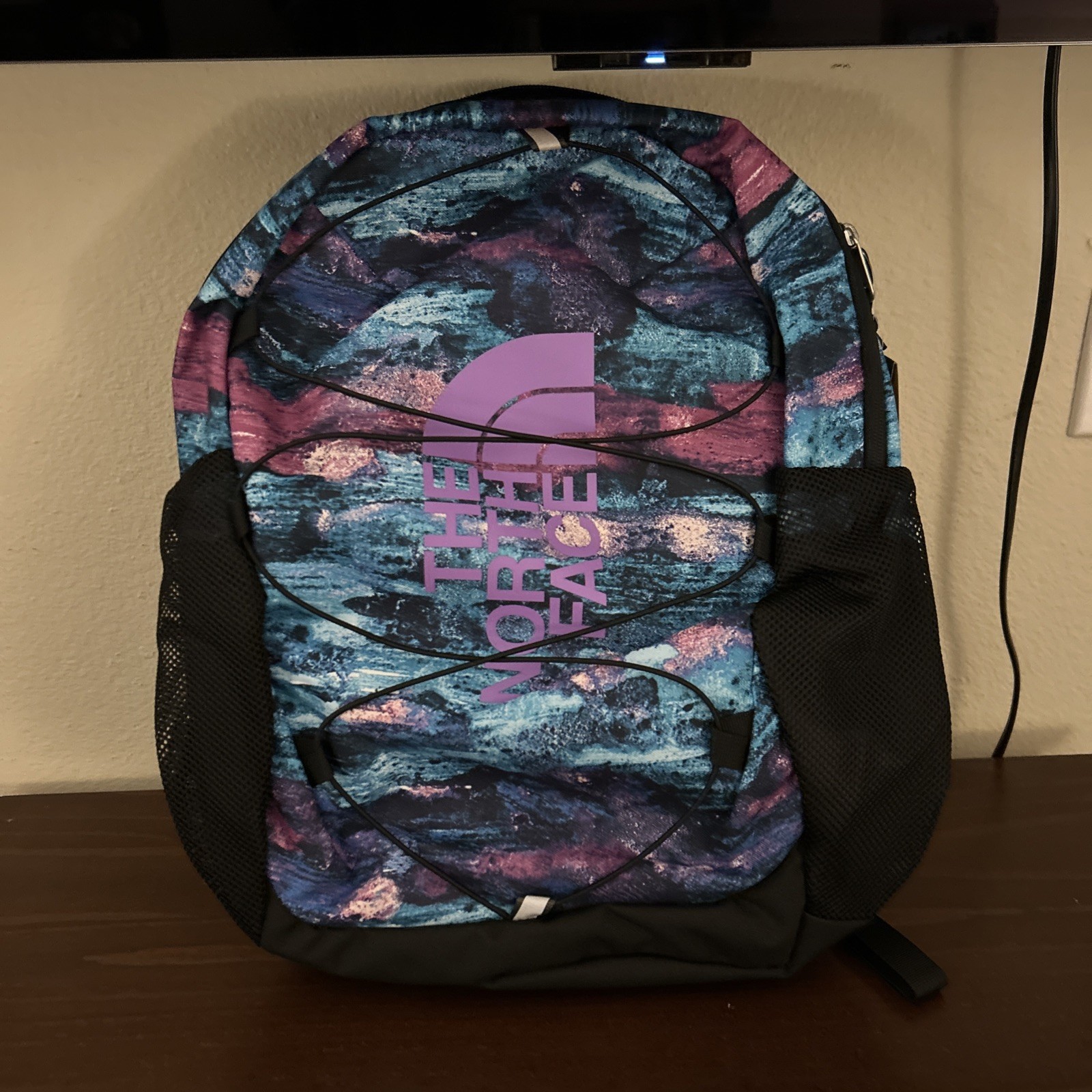 North Face Youth Court Jester Backpack in Scuba Blue Multi Dye Print and Black
