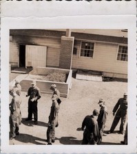 WW2 Photo of Young Soldier Standing Outside Wooden Barracks