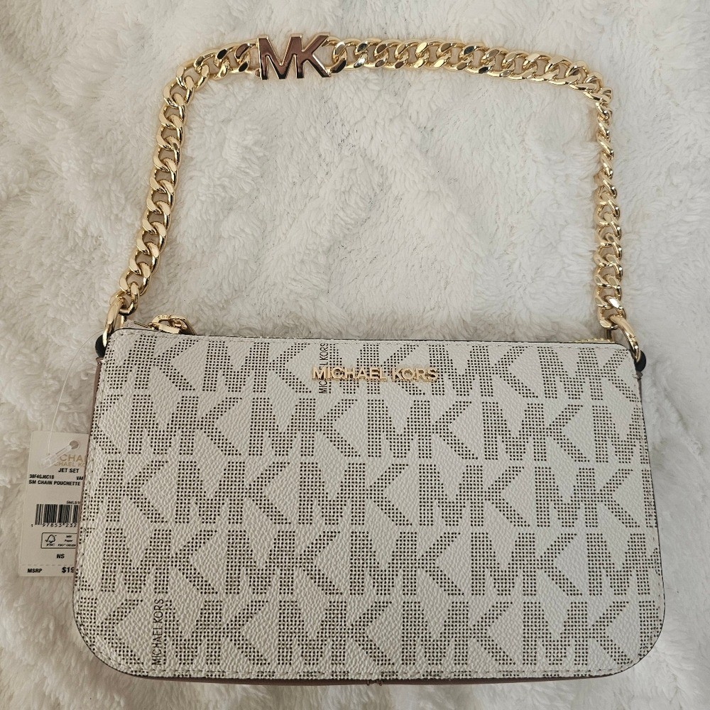 This is a Michael Kors Jet Set Small Chain Pouchette in vanilla/lugg color.