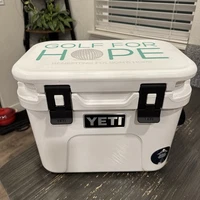 YETI Roadie 15 Hard Cooler with DoubleDuty Shoulder Strap, White Golf For Hope