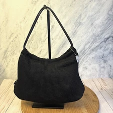 The Sak Black Crochet Double Handled Lined Handbag Purse Metal Hang tag