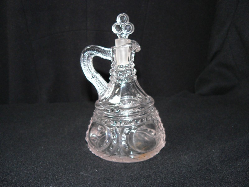 Cruet #ZZ #010 cruet NOS with rope handle clear manufacture unknown circa 1890’s