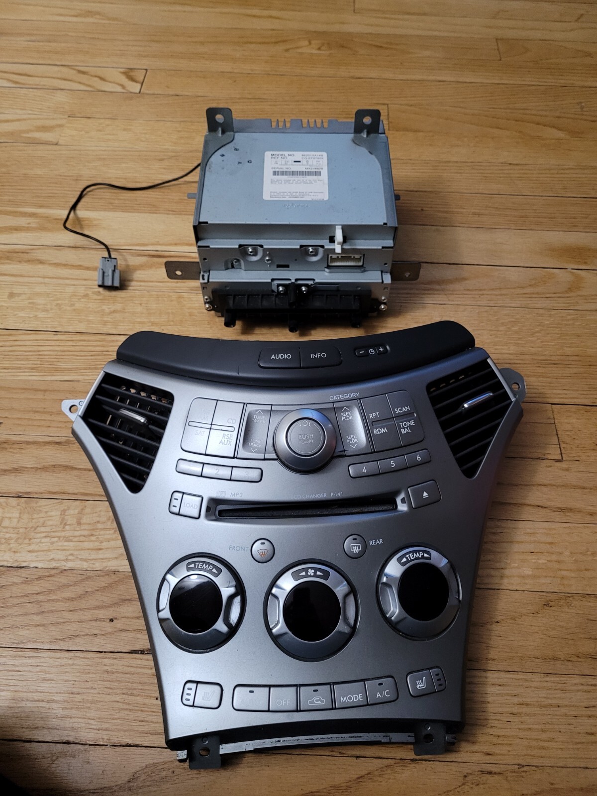 0814 Subaru Tribeca Radio Climate Control Panel Faceplate Dash Trim