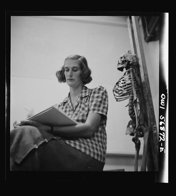 Photo:1930s 1940s Woman Student Drawing Skeleton Classroom Study