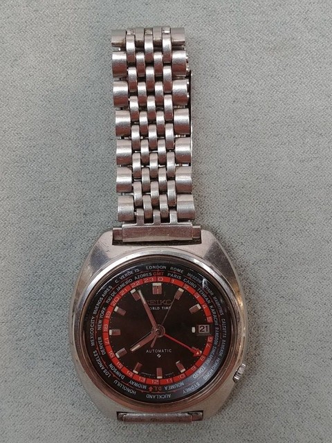 Vintage Seiko World Time GMT 6117-6400 Automatic SS w/ Rotating Dial Daini