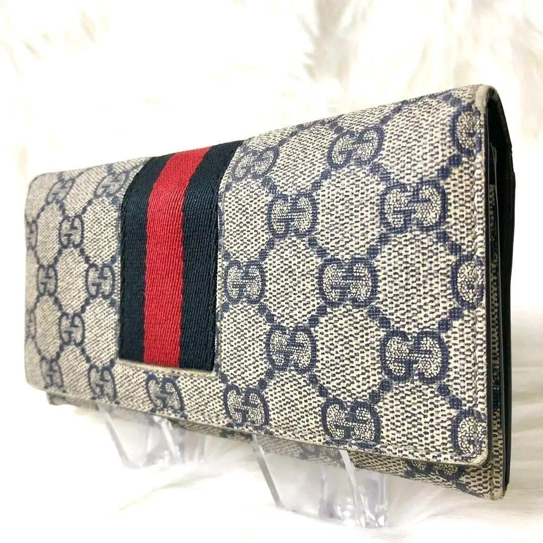 Portefeuille long Gucci GG Supreme ligne Sherry jamais utilisé authentique
