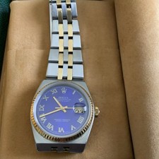 MEN'S ROLEX DATEJUST BLUE ROMAN DIAL TWO-TONE JUBILEE FLUTED BEZEL DATE