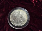 1999 AMERICAN SILVER EAGLE COIN, 99.9% SILVER Uncirculated; Toning