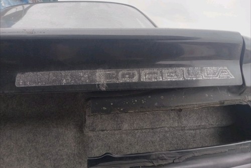 CENTER PANEL 88-91 Toyota Corolla Rear CENTER LICENSE PLATE PANEL Black - Foto 5 di 7