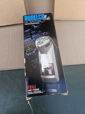 NOS - Phillips Norelco HP-1328 Rotatract Rechargeable Electric Shaver