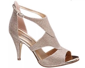 catwalk gold heels