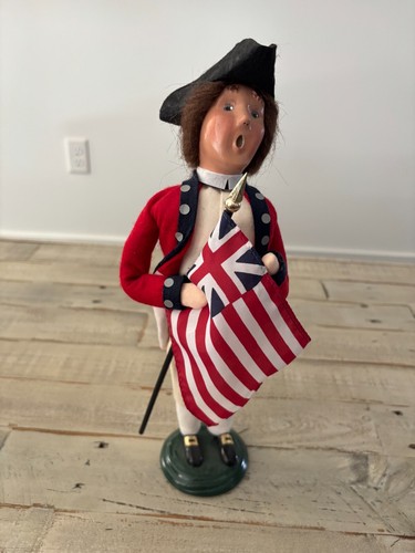Byer's Carolers British soldier holding a flag